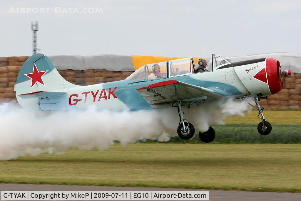 G-TYAK, 1989 Bacau Yak-52 C/N 899907, Departing for a short display routine.