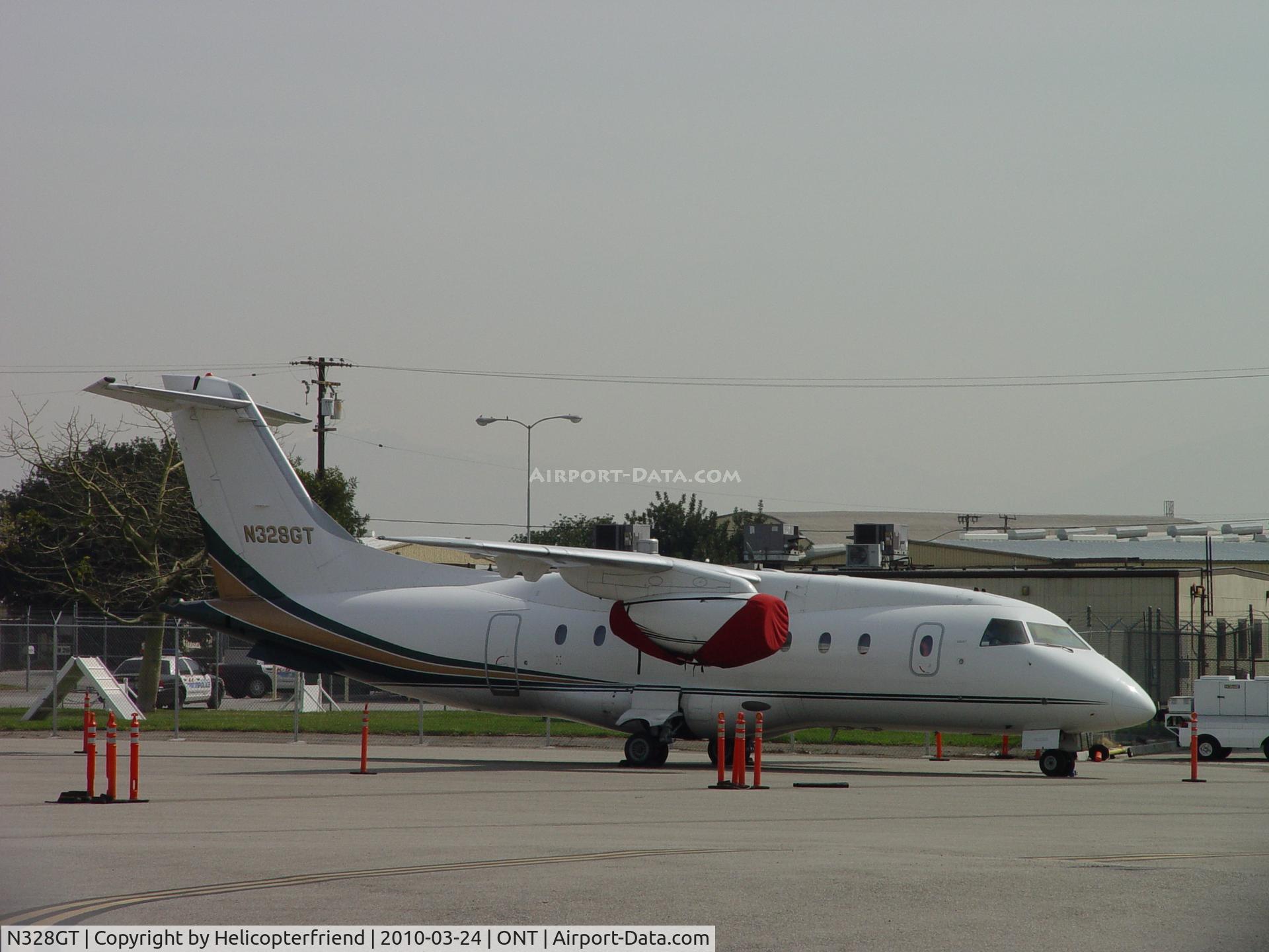 N328GT, 2001 Fairchild Dornier 328-300 328JET C/N 3183, Parked on the southside of Ontario
