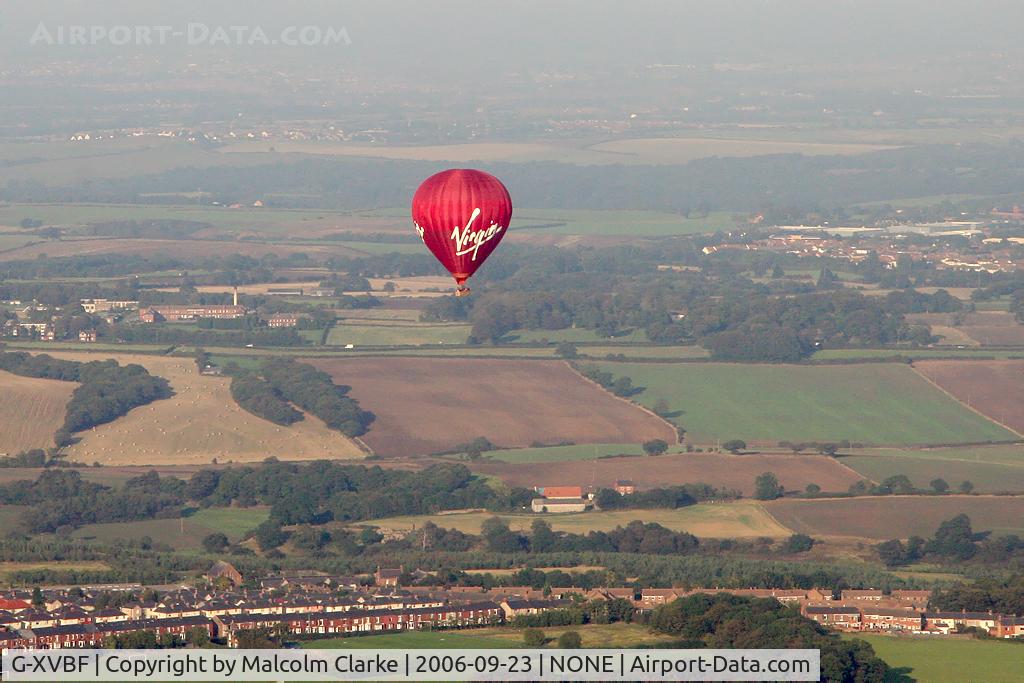 G-XVBF, 2004 Lindstrand Balloons Ltd LBL 330A C/N 966, Lindstrand LBL-330A. Taken from R44 G-MGWI over Co Durham, UK in 2006.