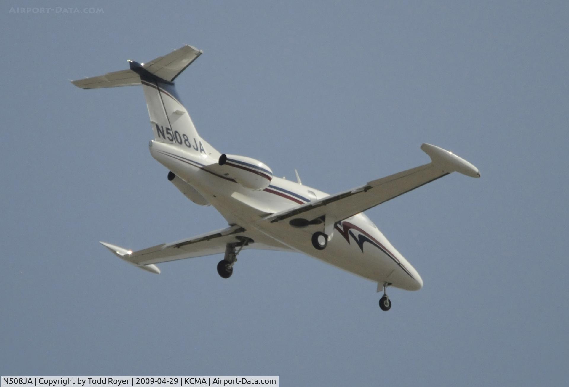 N508JA, 2006 Eclipse Aviation Corp EA500 C/N 000001, From the backyard