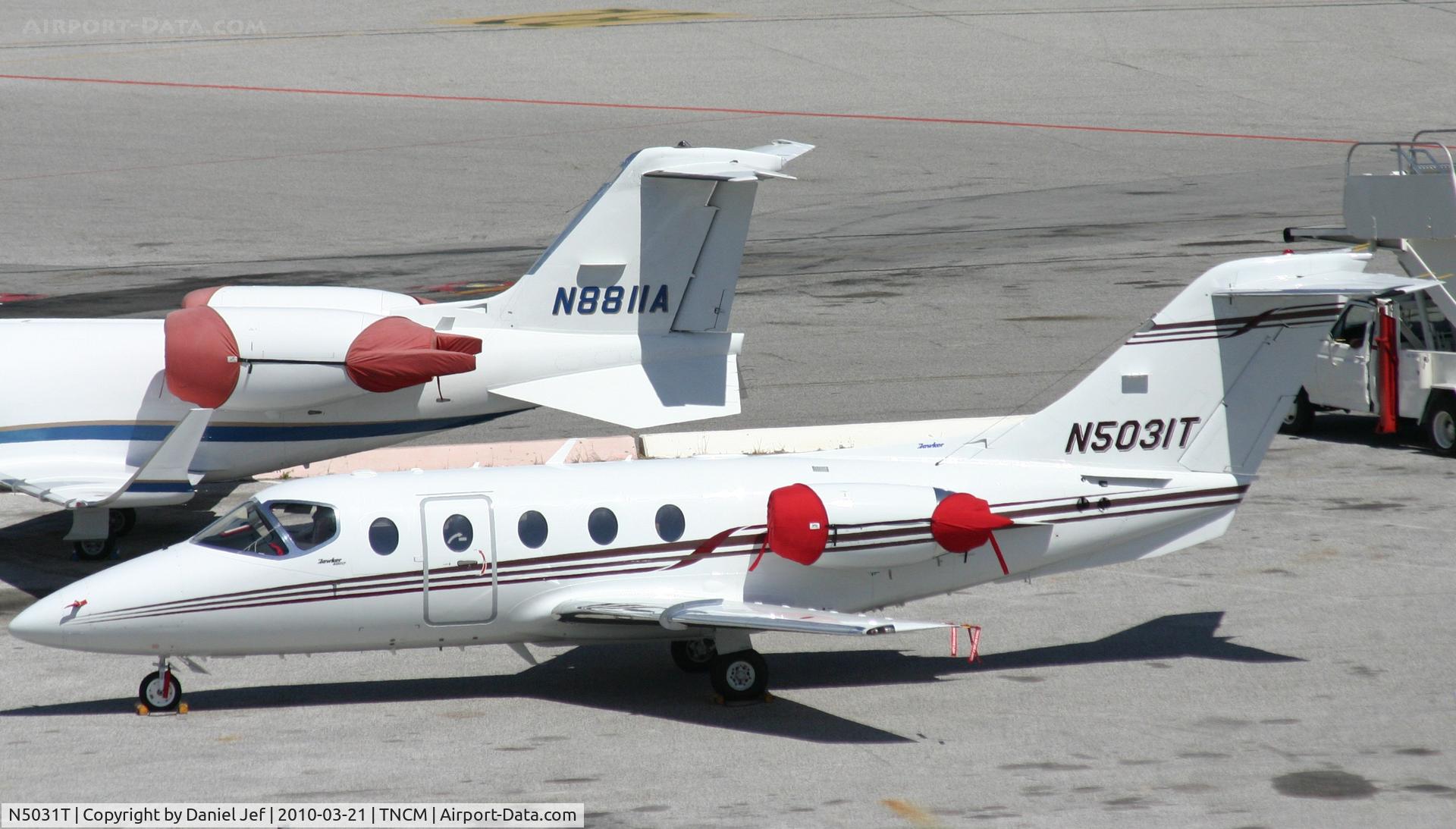 N5031T, Hawker Beechcraft 400A Beechjet C/N RK-590, N503IT park on the main ramp at TNCM