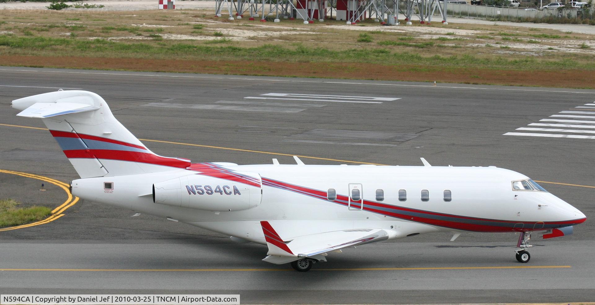 N594CA, 2005 Bombardier Challenger 300 (BD-100-1A10) C/N 20082, N594CA taxing for take at TNCM