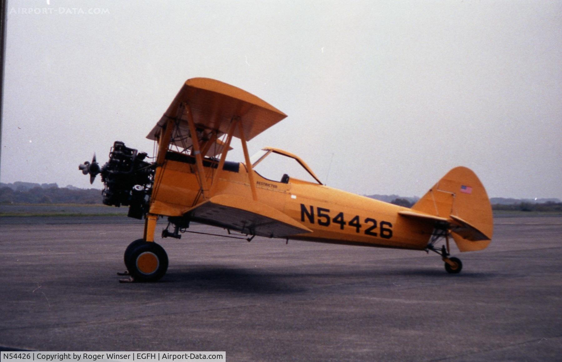 N54426, 1941 Boeing A75N1(PT17) C/N 75-1696, Visiting Boeing Stearman Ag-Kaydet. Mid 1990's