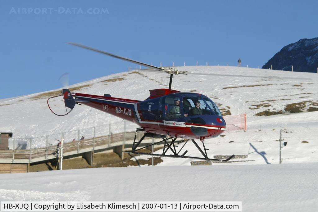 HB-XJQ, 1996 Enstrom 480 C/N 5018, at Lauberhorn