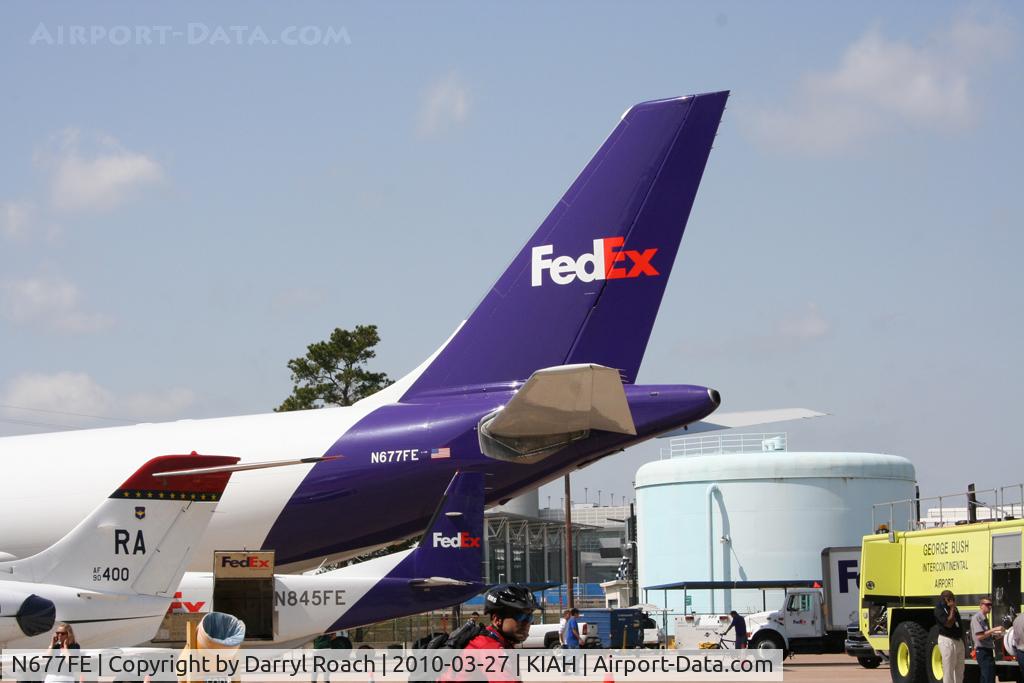 N677FE, 1998 Airbus A300F4-605R C/N 791, FDX A306 tail eclipses a company C208 and a USAF JayHawk.