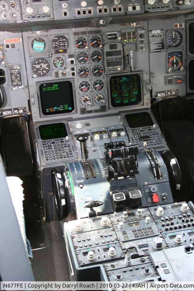 N677FE, 1998 Airbus A300F4-605R C/N 791, A306 throttle quadrant & FMS.