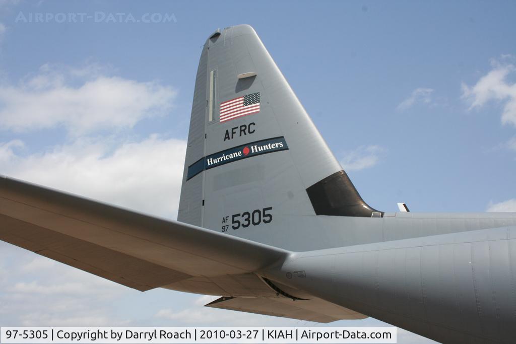 97-5305, 1997 Lockheed WC-130J Hercules C/N 382-5475, The tail of a Hurricane Hunter soaks up the warm sun.