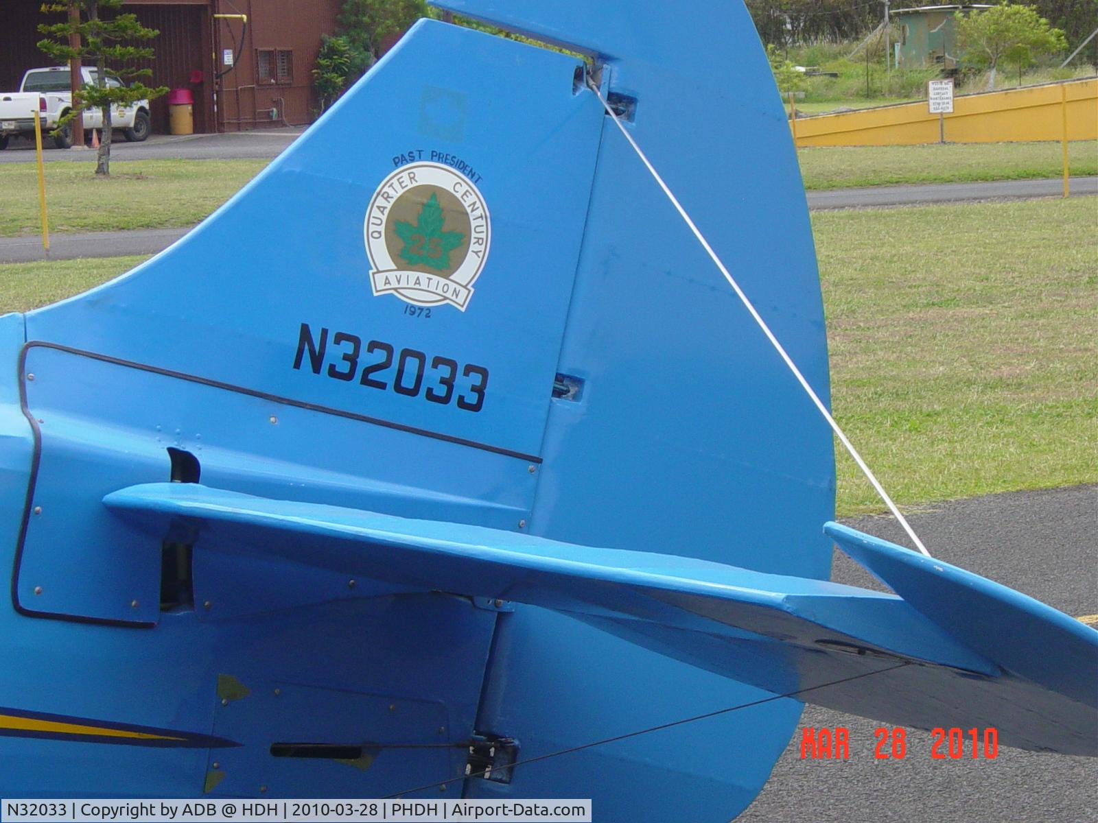 N32033, 1941 Waco UPF-7 C/N 5653, The Waco's tail.  Don't know why registratiion is on other aircraft too.