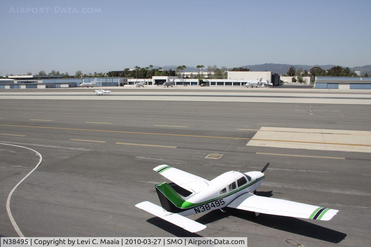 N38495, 1977 Piper PA-28R-201T Cherokee Arrow III C/N 28R-7703229, on the transient ramp