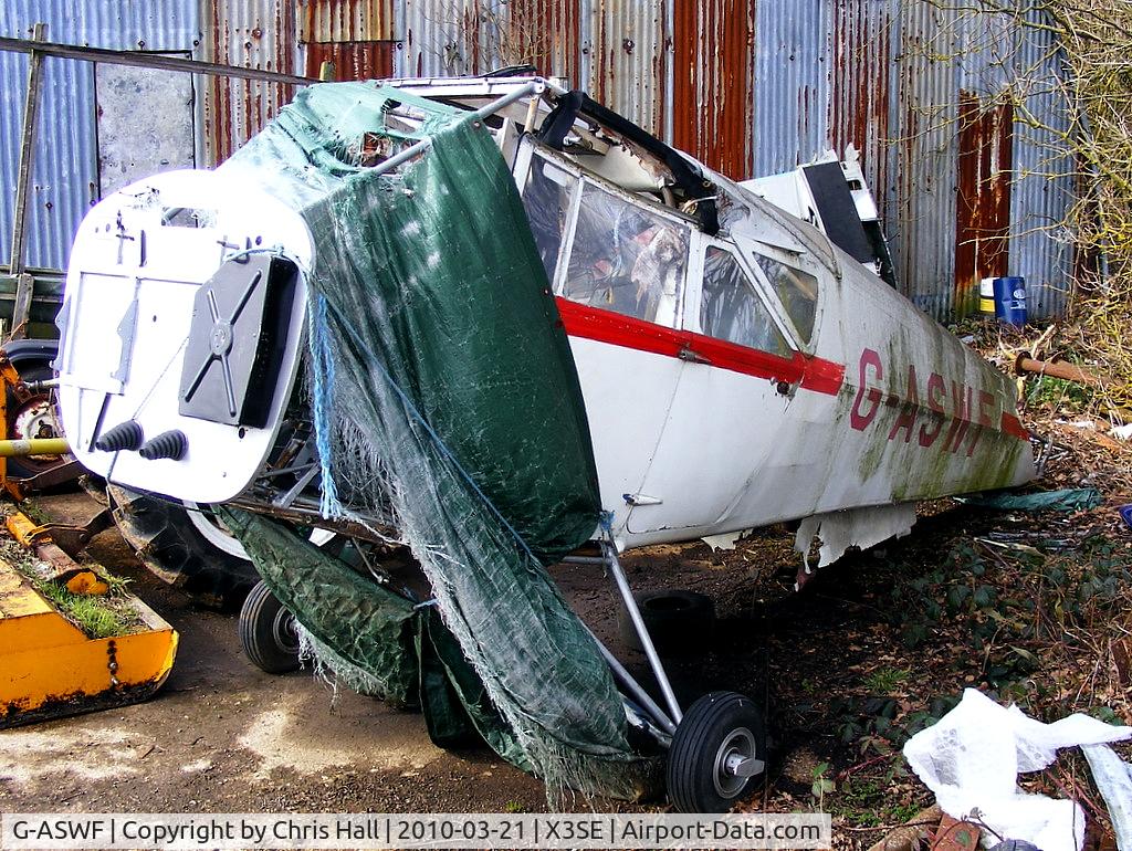 G-ASWF, 1964 Beagle A-109 Airdale C/N B.537, remains of Beagle A.109 Airedale behind one of the hangars