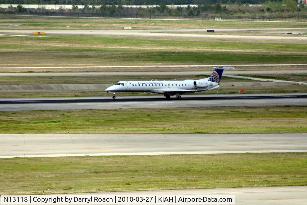 N13118, 2002 Embraer ERJ-145XR (EMB-145XR) C/N 145675, ERJ touches down 26L.