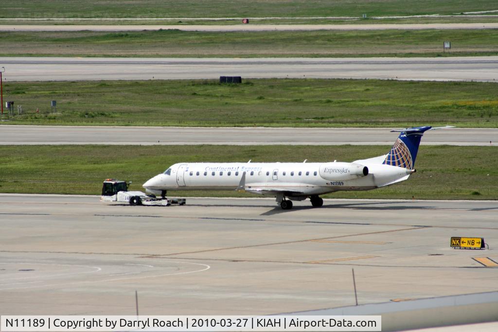 N11189, 2005 Embraer ERJ-145XR (EMB-145XR) C/N 14500931, ERJ gets towed.