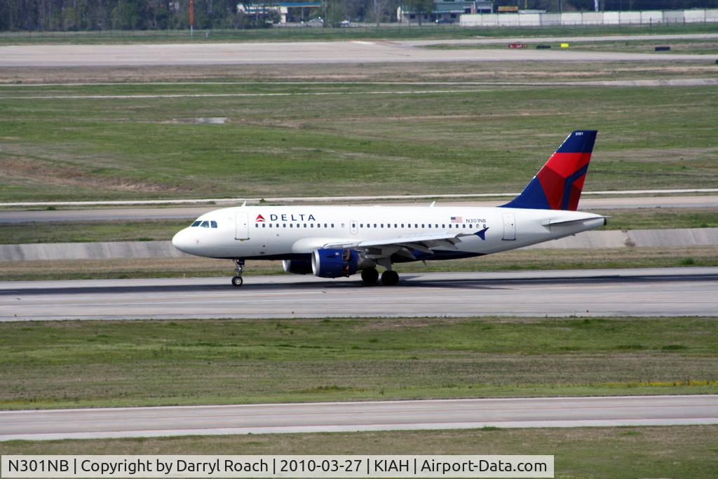 N301NB, 1999 Airbus A319-114 C/N 1058, DAL A319 sets reverse thrust. She looked like a B752 coming in, hard to distinguish.