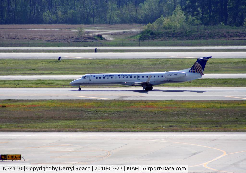 N34110, 2002 Embraer ERJ-145XR (EMB-145XR) C/N 145658, ERJ departing 15L.
