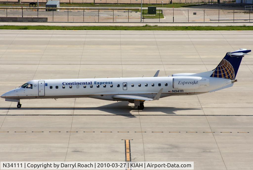 N34111, 2002 Embraer ERJ-145XR (EMB-145XR) C/N 145659, ERJ taxis in.