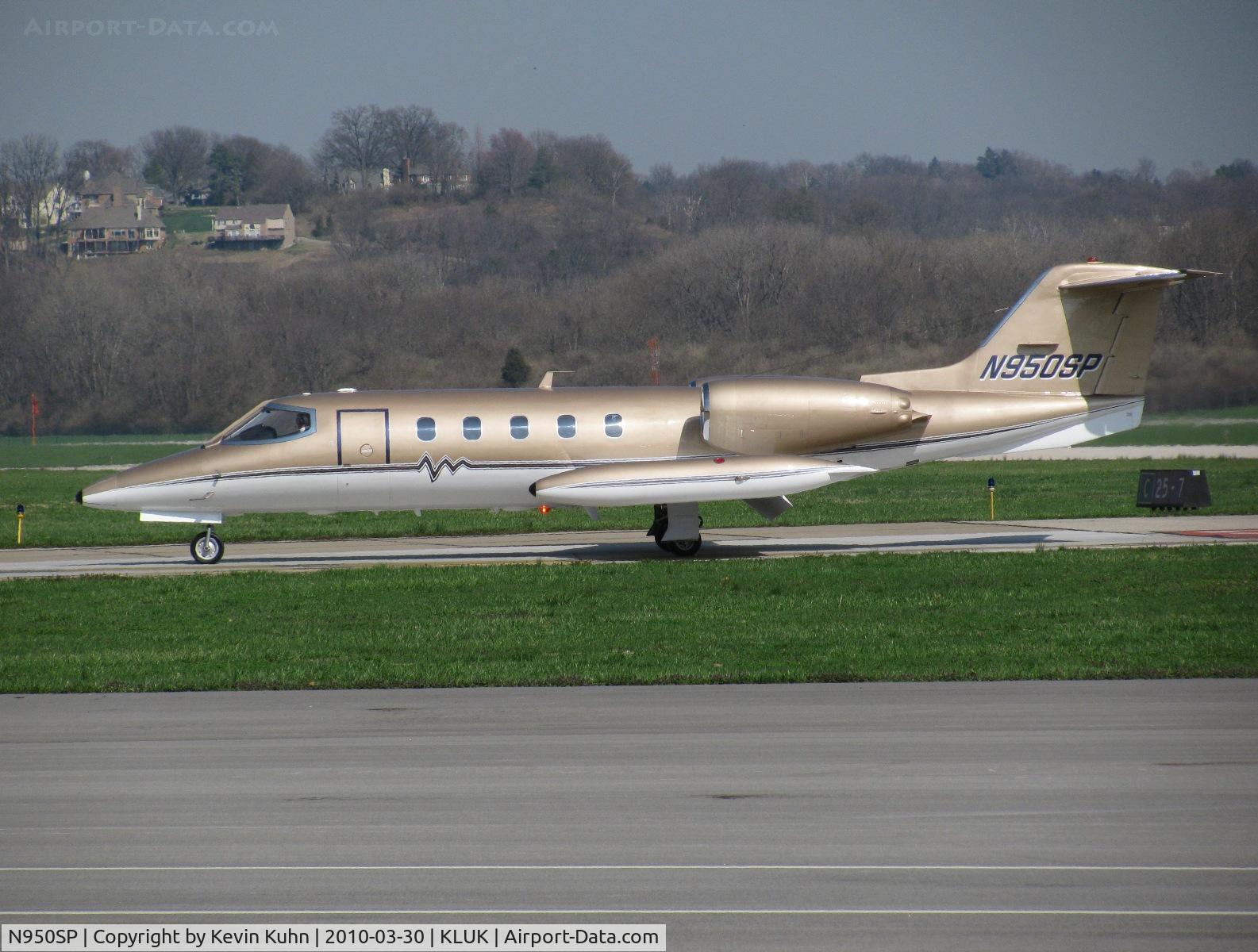N950SP, Gates Learjet 35A C/N 35A-450, Pretty sure that's the first gold aircraft I've ever seen.