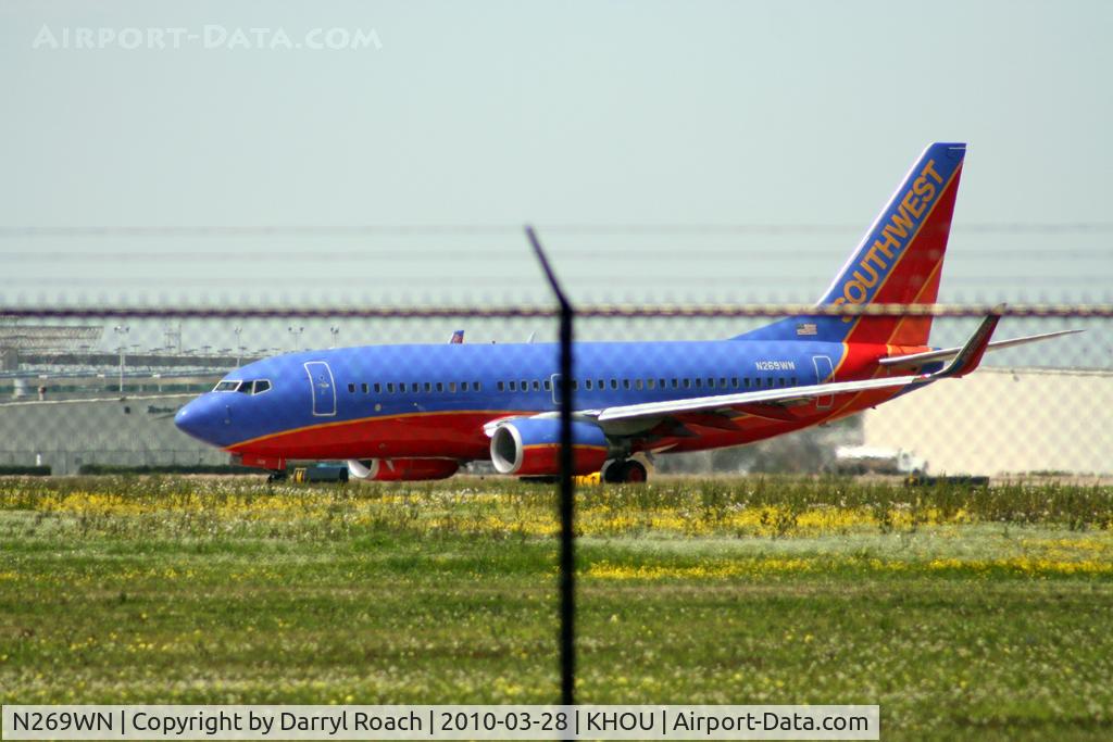 N269WN, 2007 Boeing 737-7H4 C/N 32526, B737 waits to depart 30L.
