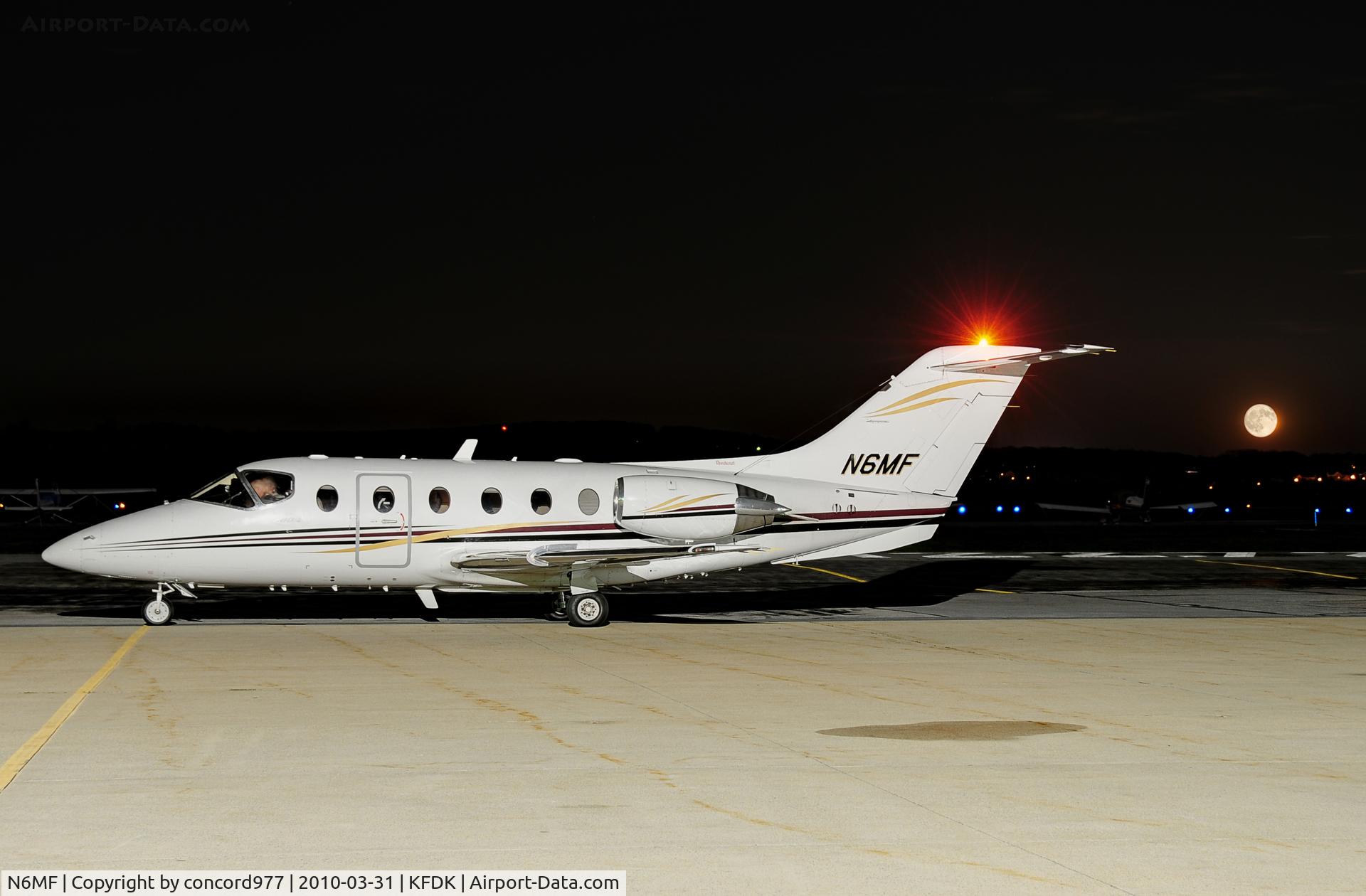 N6MF, 2001 Raytheon Aircraft Company 400A C/N RK-315, Seen at KFDK on 3/31/2010.  Fullish moon rising.