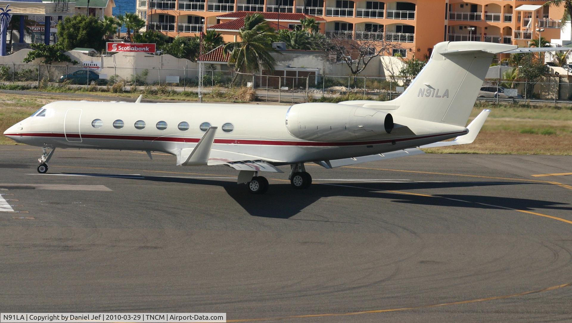 N91LA, 2003 Gulfstream Aerospace GV-SP (G550) C/N 5027, N91LA at the lines to depart TNCM runway 10