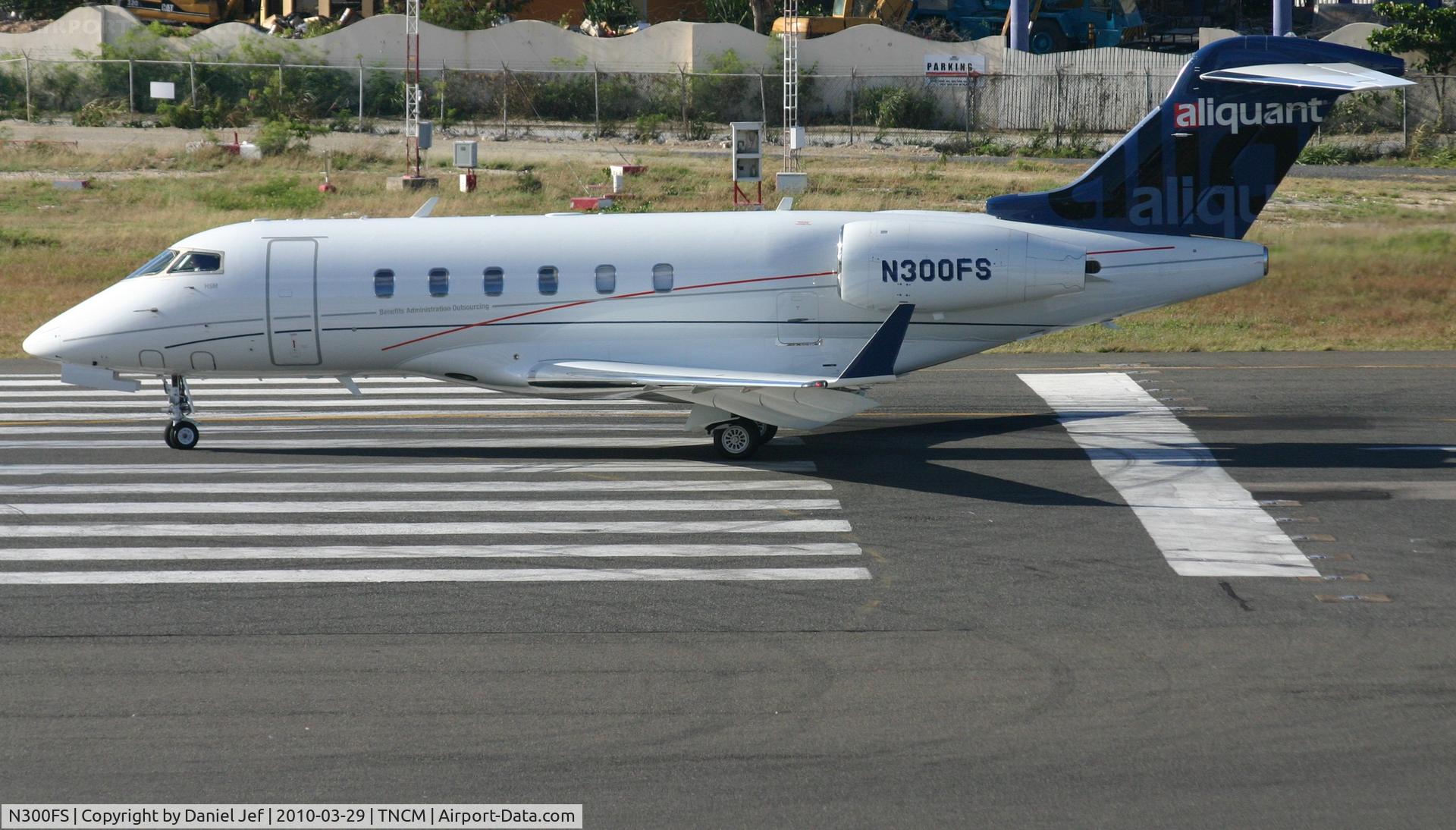 N300FS, 2007 Bombardier Challenger 300 (BD-100-1A10) C/N 20143, N300FS at the lines at TNCM for departure on runway 10