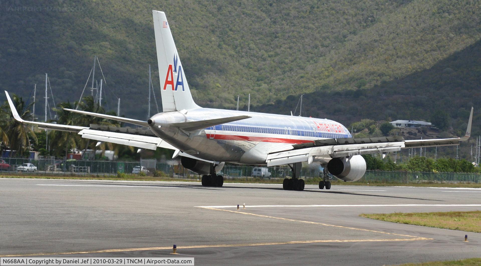 N668AA, 1992 Boeing 757-223 C/N 25333, American Airlines just landed at TNCM and rolling out to the end of the runway 10!!!