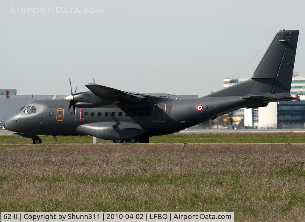 62-II, Casa CN-235-200M C/N C111, Taxiing rwy 32R for departure...