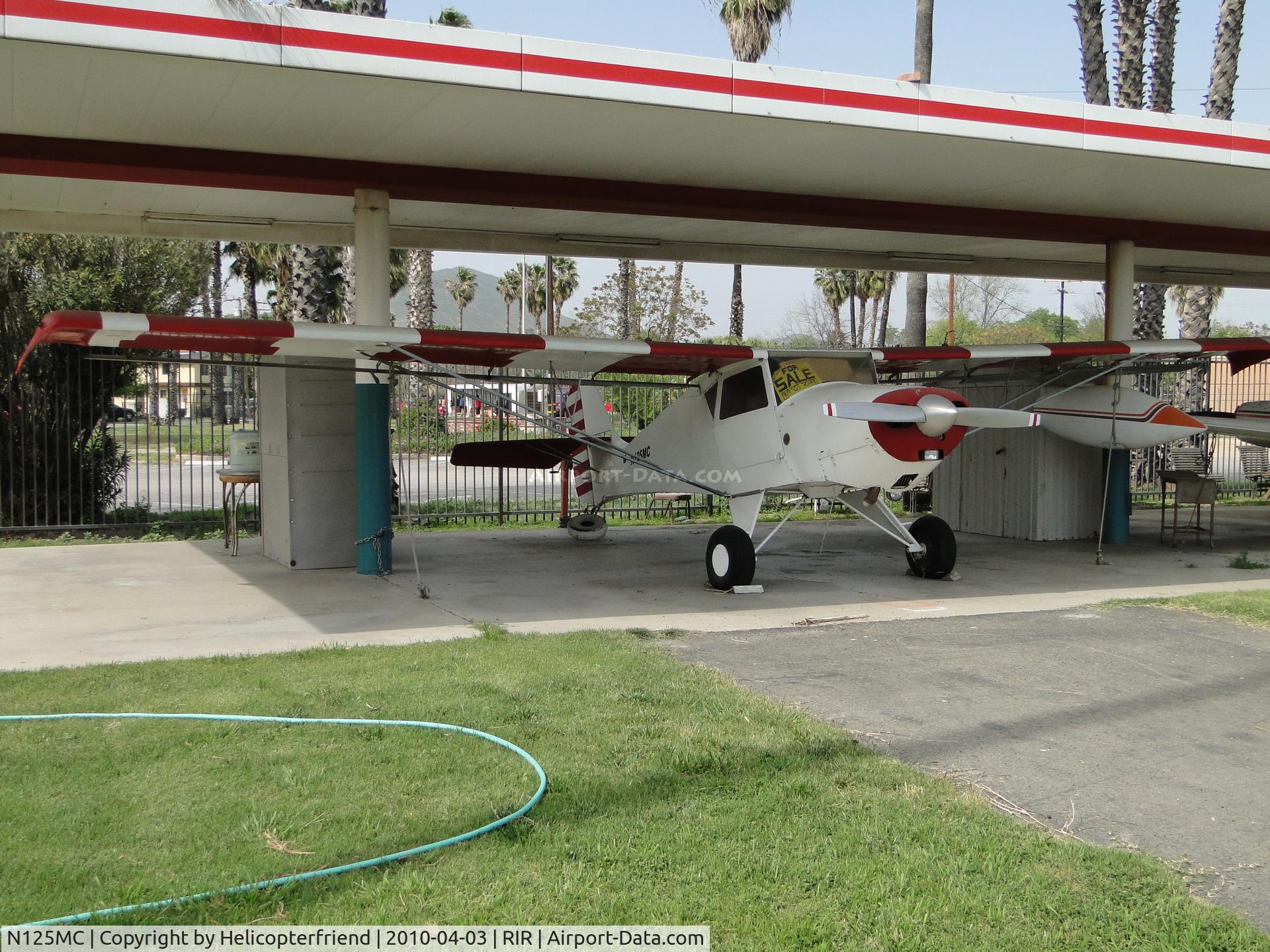 N125MC, 1991 Rans MT Coyote C/N 1001, Parked under a canopy waiting to be bought