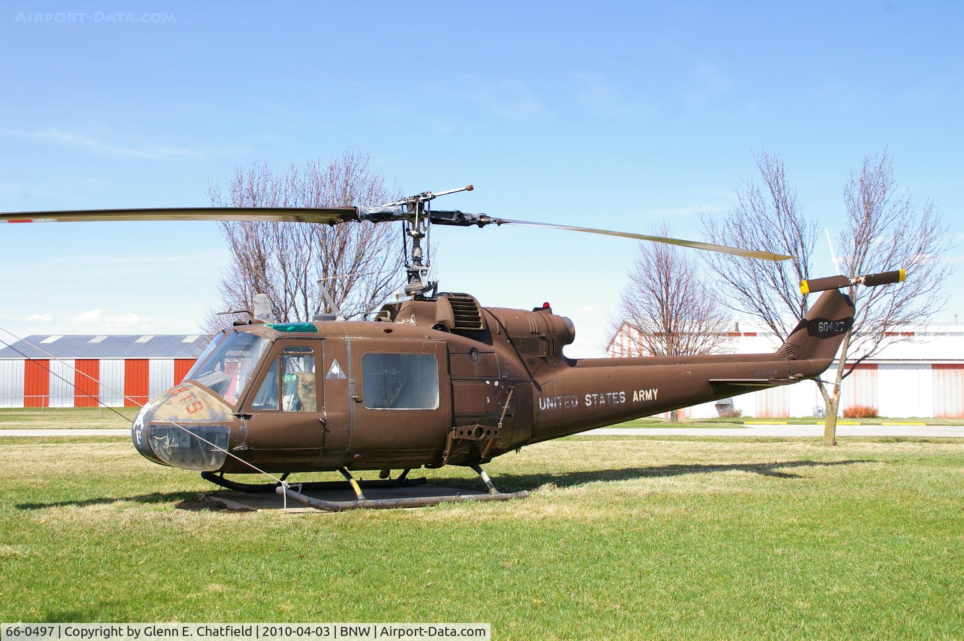 66-0497, 1966 Bell UH-1M Iroquois C/N 1479, Gate Guardian for main airport entrance