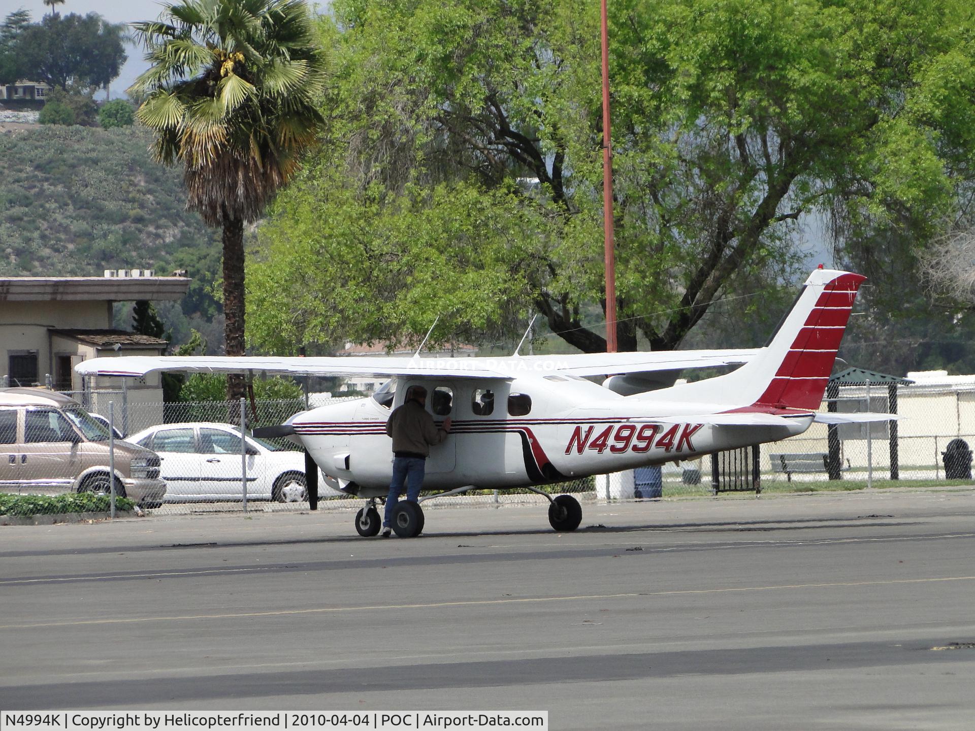 N4994K, 1979 Cessna P210N Pressurised Centurion C/N P21000392, Parked in transient parking and making sure it's secured
