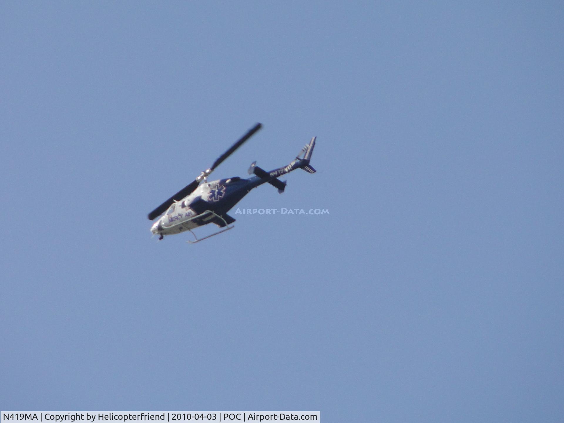 N419MA, 1984 Bell 222UT C/N 47518, Flying westbound through the northside of Brackett air space