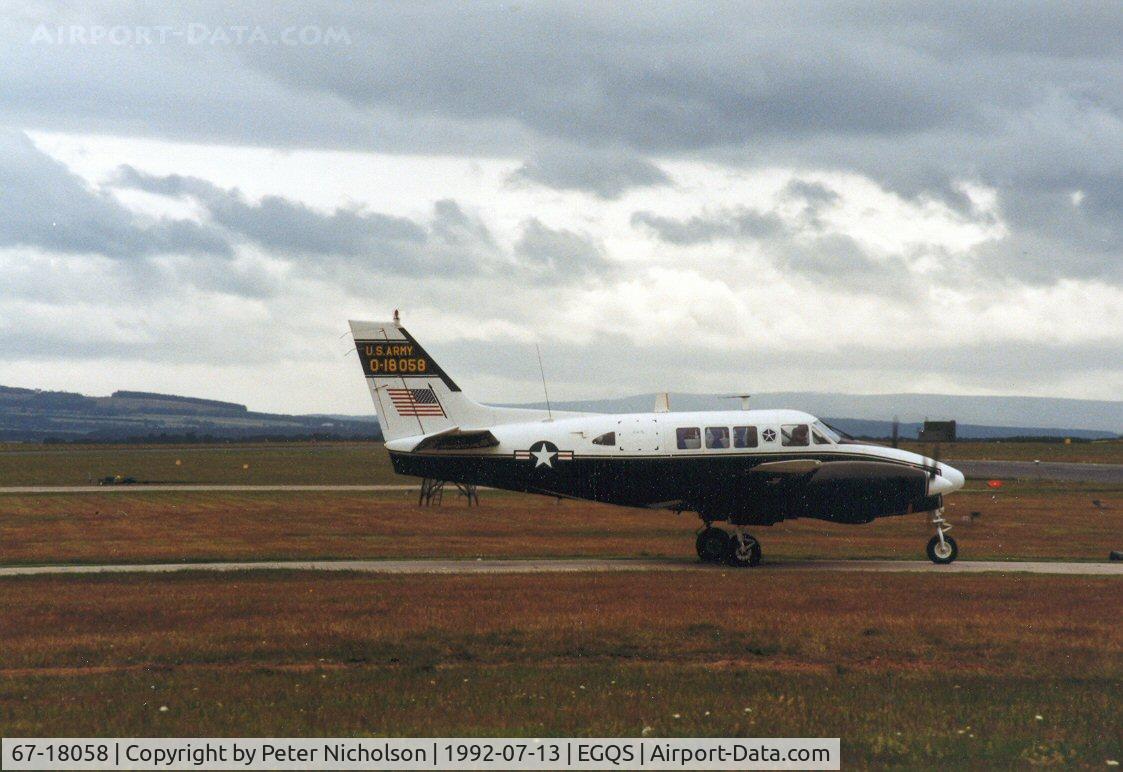 67-18058, 1967 Beech U-21A Ute C/N LM-59, U-21A Ute of V Corps US Army in Europe based at Heidelberg awaiting clearance to join the active runway at RAF Lossiemouth in the Summer of 1992.