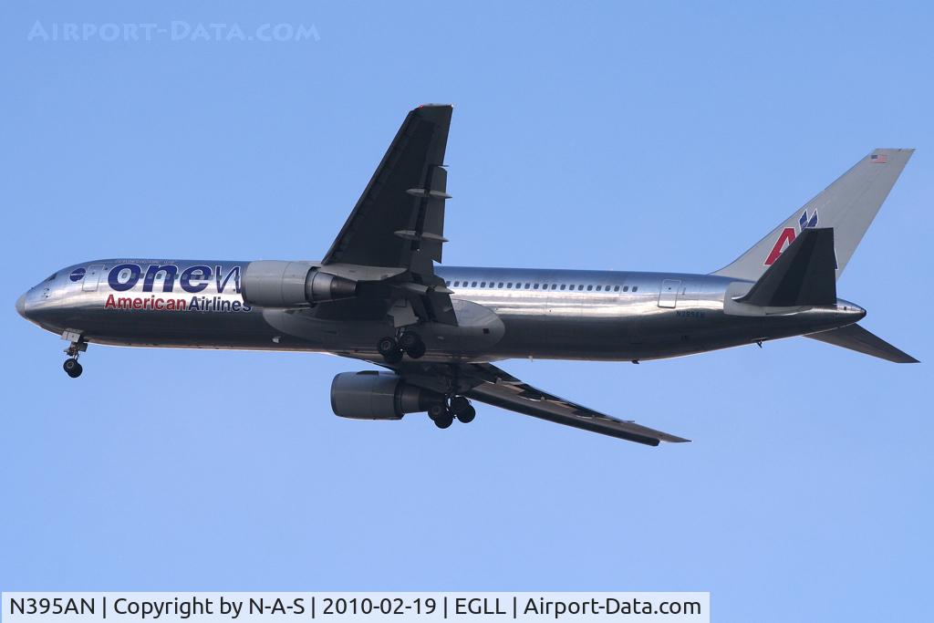 N395AN, 1998 Boeing 767-323 C/N 29432, One World coloured 767 leaving his gear down