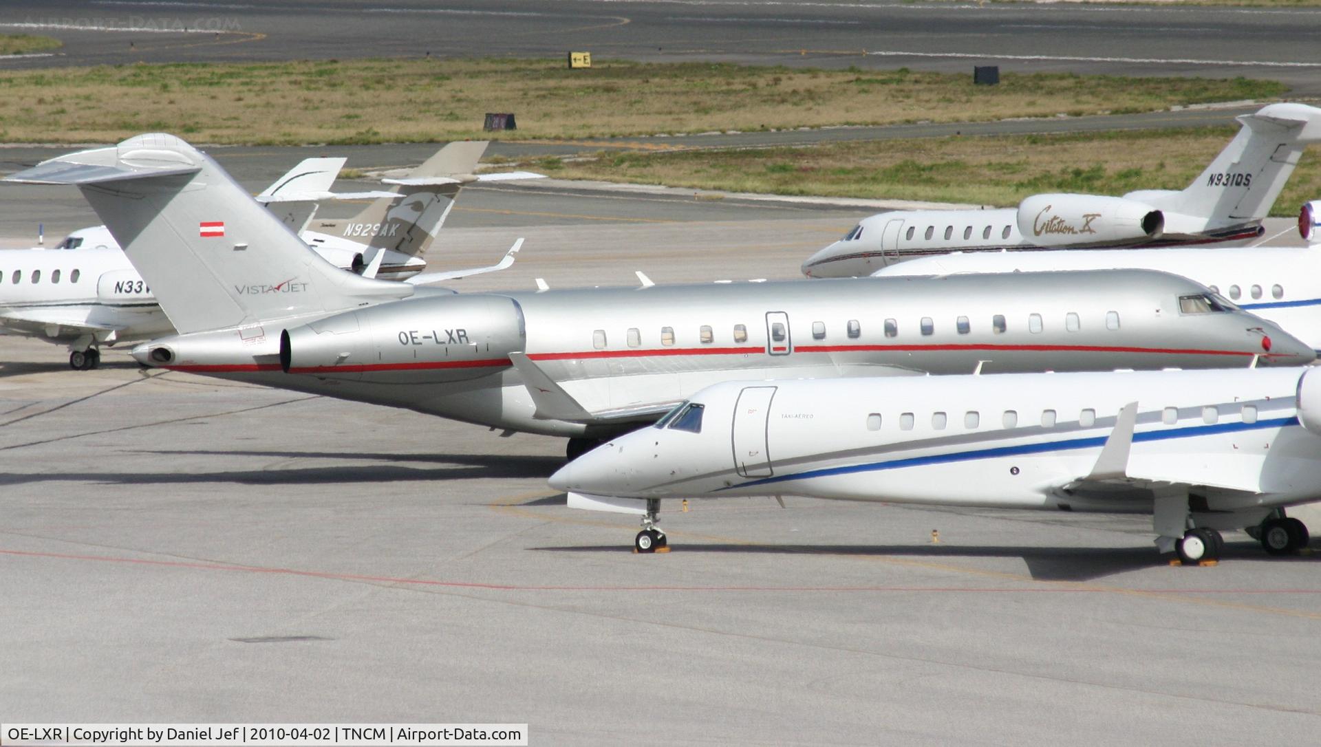 OE-LXR, 2008 Bombardier BD-700-1A10 Global Express XRS C/N 9235, OE-LXR park at the main ramp at TNCM between the other nice birds