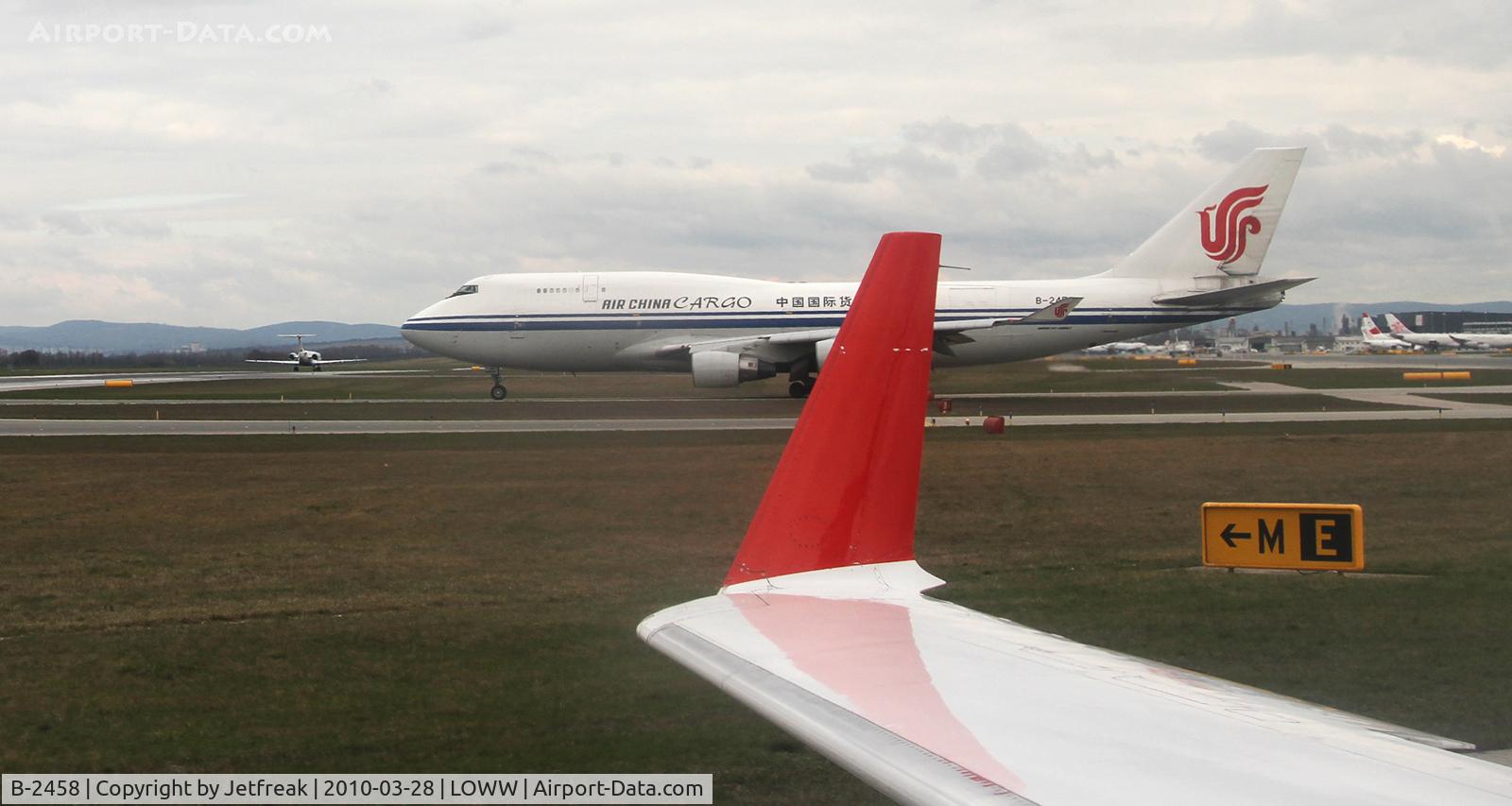 B-2458, 1990 Boeing 747-4J6/BCF C/N 24347, Air China Cargo Boeing 747-4J6 (M), c/n: 24347 ; taken from Austrian Arrows CRJ OE-LCM OS 833 VIE-VNO