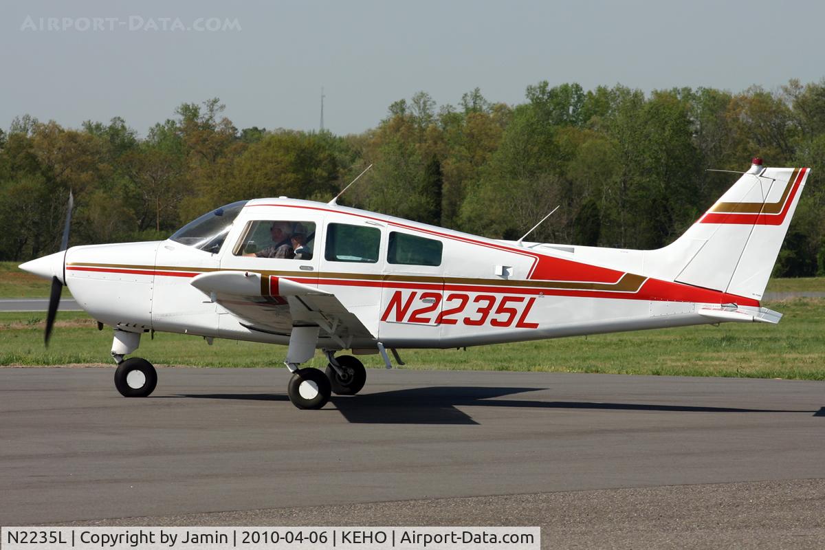 N2235L, 1976 Beech C23 Sundowner 180 C/N M-1905, Getting ready to fill up at the pumps.