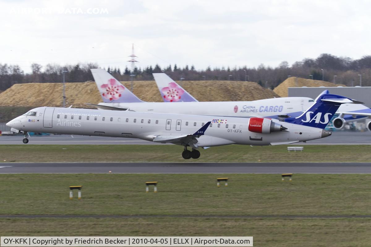 OY-KFK, 2009 Bombardier CRJ-900 (CL-600-2D24) C/N 15244, about to touchdown