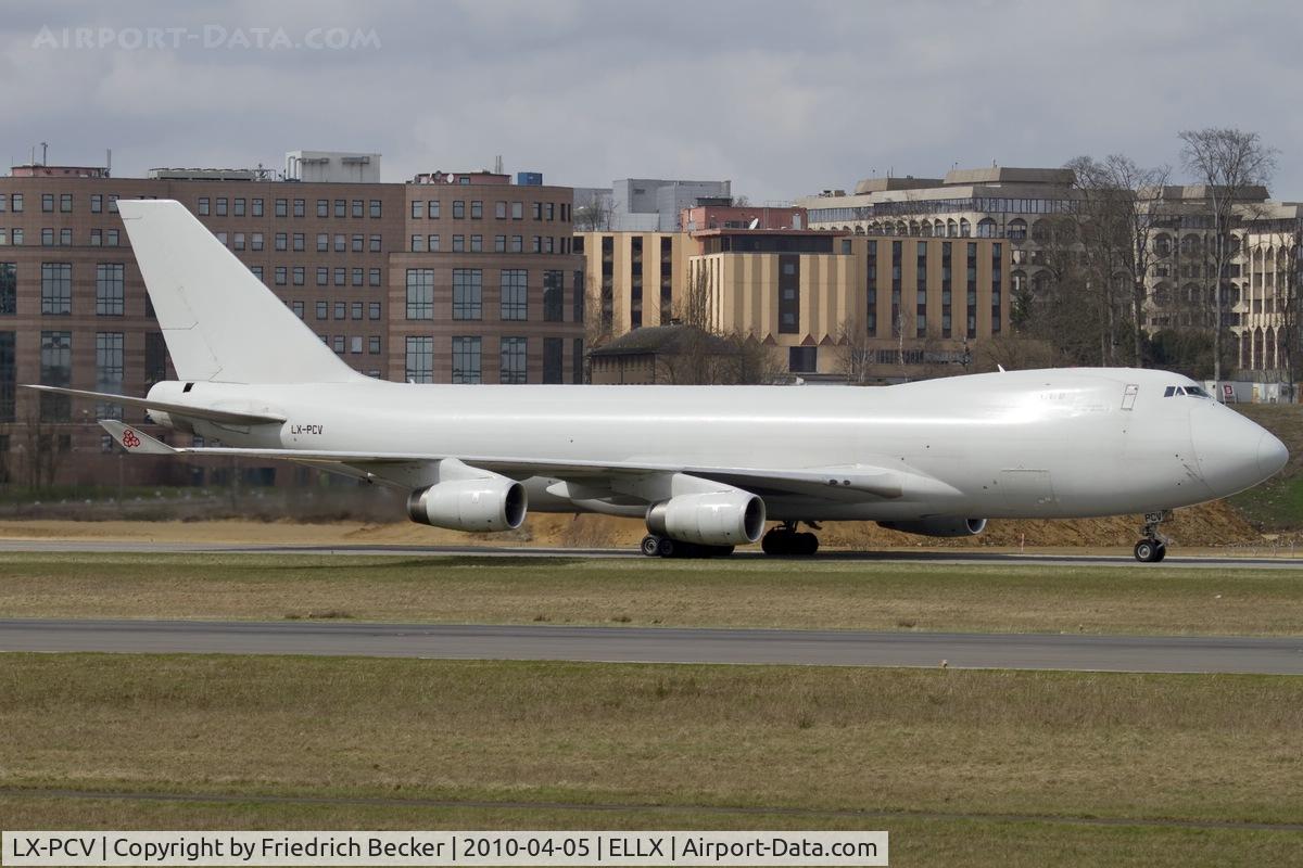 LX-PCV, 1999 Boeing 747-4R7F/SCD C/N 29732, taxying to the cargo center at Luxembourg