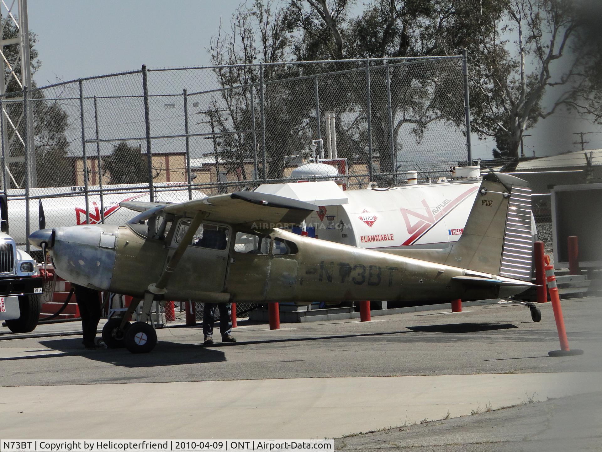 N73BT, 1965 Cessna 180H Skywagon C/N 18051606, Taxied to gas pump and being refueled