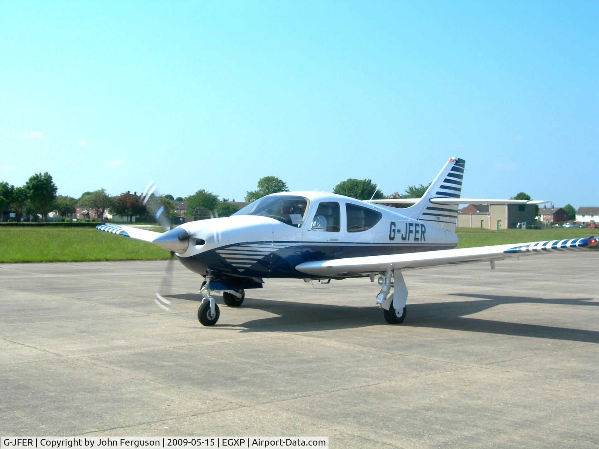 G-JFER, 1996 Rockwell Commander 114B C/N 14638, G-JFER at RAF Scampton (Home of the Dambusters)