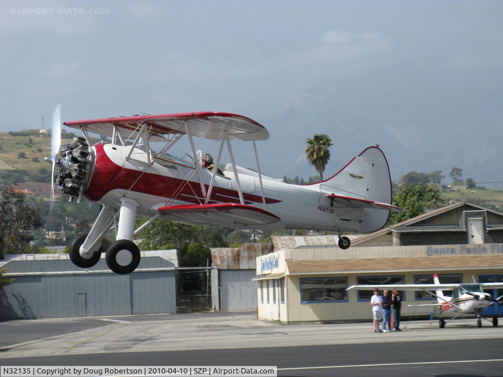 N32135, 1941 Waco UPF-7 C/N 5767, 1941 Waco UPF-7, Continental W670 220 Hp, a stunning showplane, chromed engine, prop & spinner, takeoff climb Rwy 22