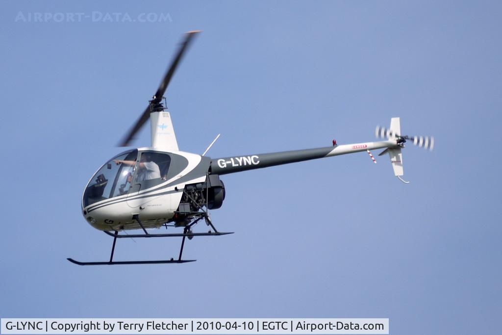 G-LYNC, 2000 Robinson R22 Beta C/N 3069, Robinson R22 on local flight around Cranfield