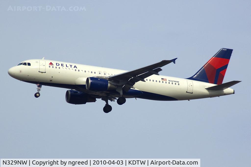 N329NW, 1992 Airbus A320-211 C/N 306, Landing 22R at DTW