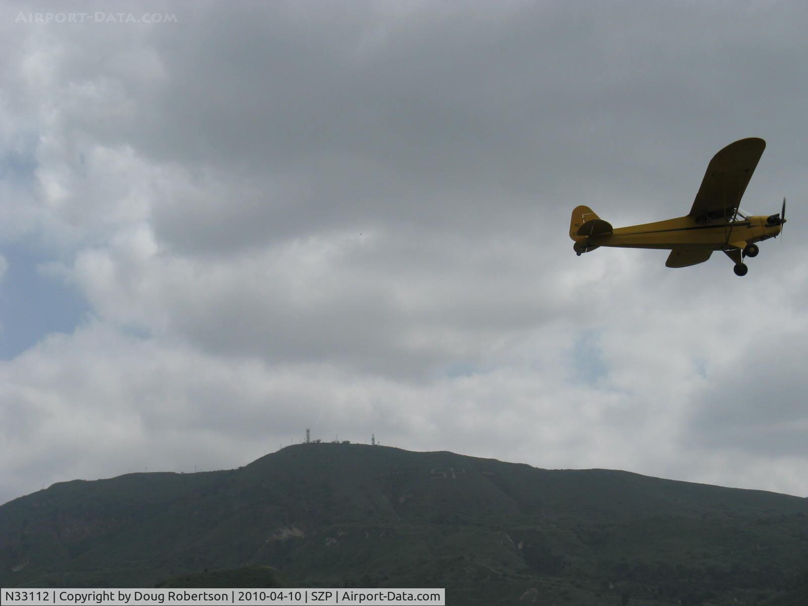 N33112, 1940 Piper J3C-65 Cub Cub C/N 5830, 1940 Piper J3C-65 CUB, Continental C90 90 Hp upgrade, takeoff climb Rwy 22