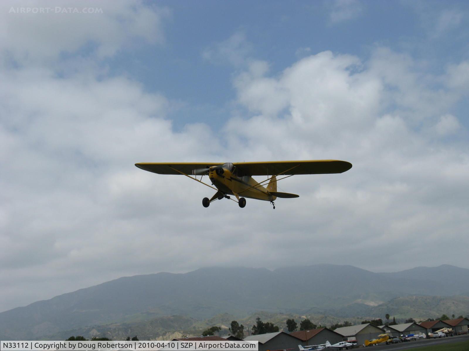 N33112, 1940 Piper J3C-65 Cub Cub C/N 5830, 1940 Piper J3C-65 CUB, Continental C90 90 Hp upgrade, takeoff climb Rwy 22