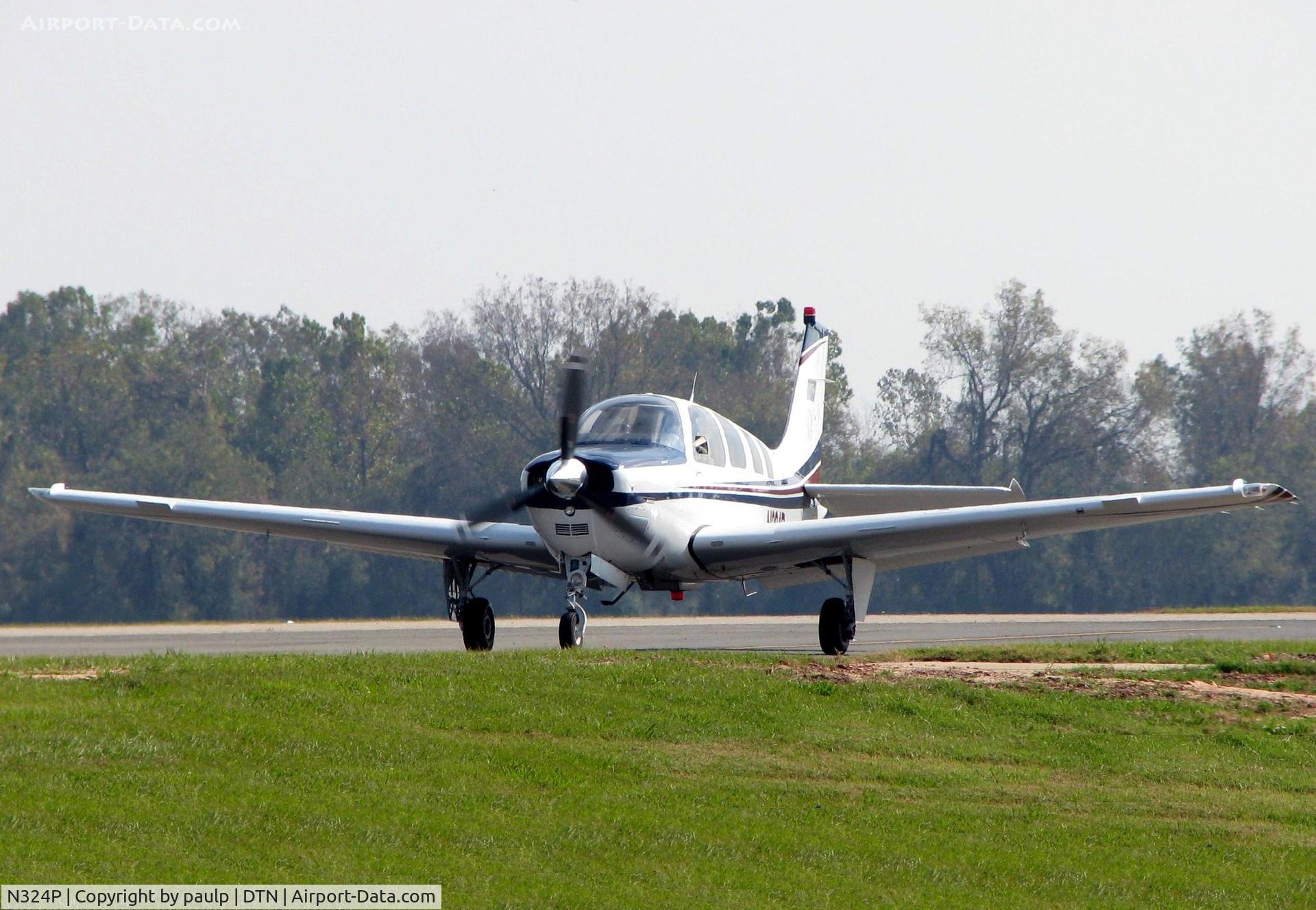 N324P, 2006 Beech G36 Bonanza C/N E-3730, Taxiing to the active at Downtown Shreveport.