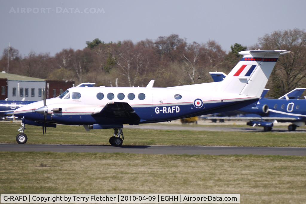 G-RAFD, 2008 Hawker Beechcraft B200GT King Air C/N BY-32, RAF Beech 200GT departs thru the Bournemouth heat haze