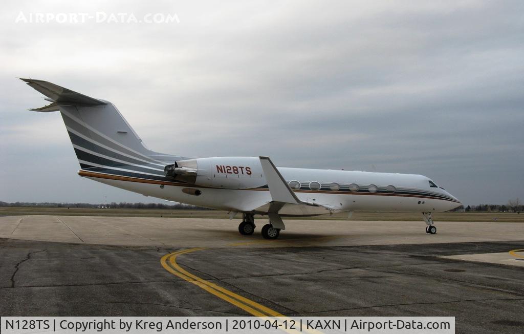 N128TS, 1995 Gulfstream Aerospace G-IV C/N 1263, Gulfstream G-IV on the ramp with clouds looming overhead.