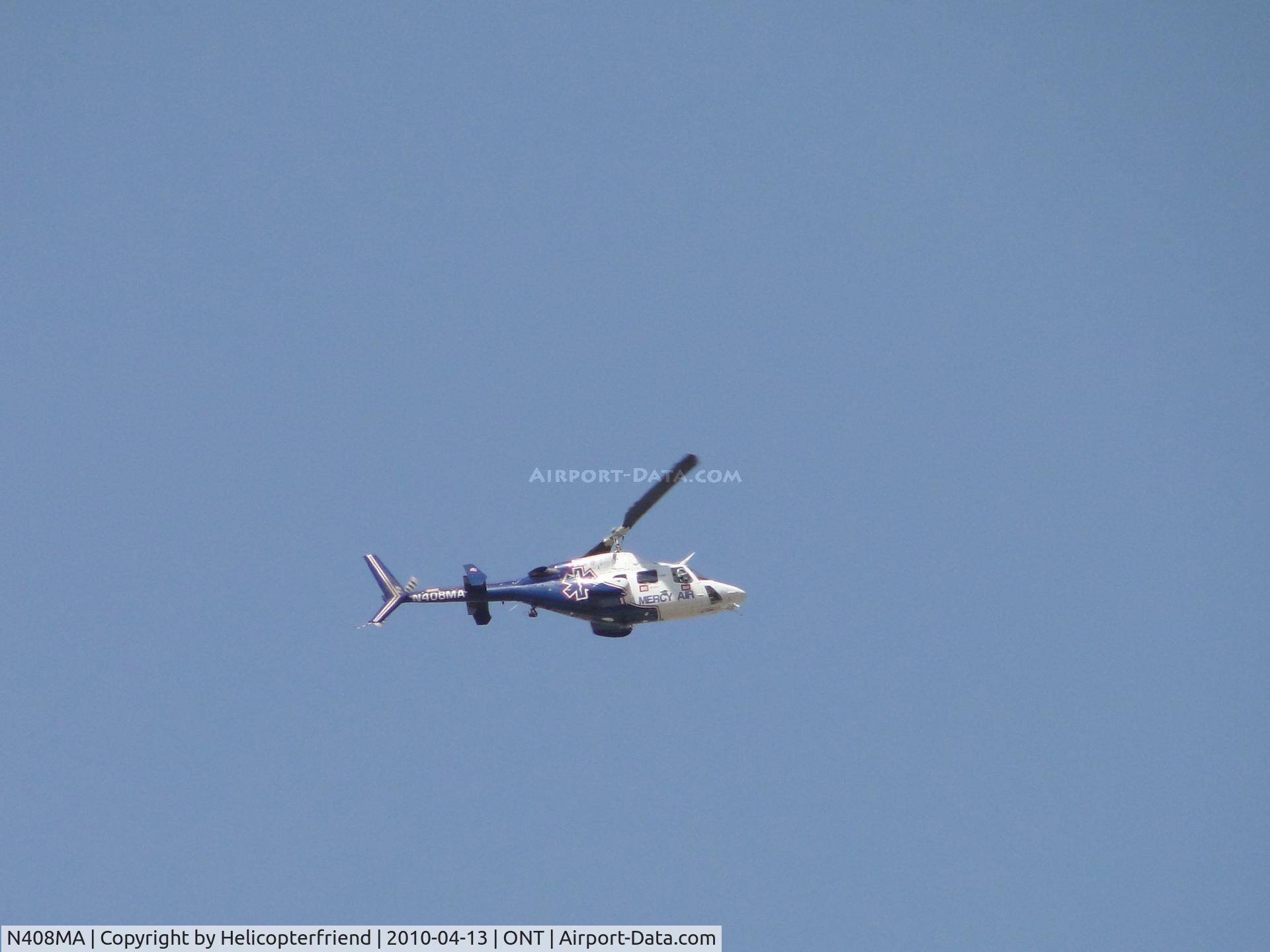 N408MA, 1983 Bell 222B C/N 47135, Crossing over midpoint of Ontario Airport, northeast bound