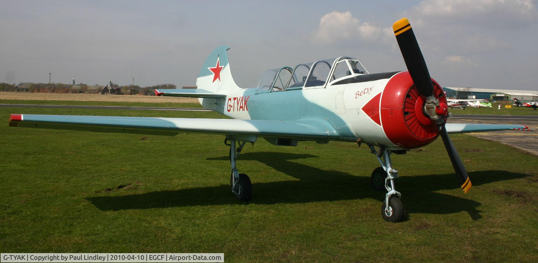 G-TYAK, 1989 Bacau Yak-52 C/N 899907, In for lunch