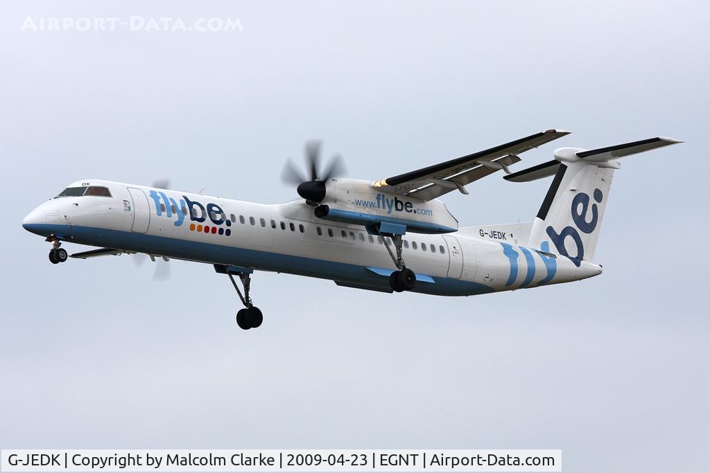 G-JEDK, 2002 De Havilland Canada DHC-8-402Q Dash 8 C/N 4065, De Havilland Canada DHC-8-402Q Dash 8 on approach to 25 at Newcastle Airport in 2009.